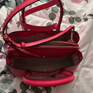 I have a Kate spade purse never used $75 Maurice’s clothes